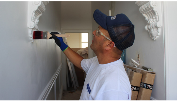 painter doing interior paint job